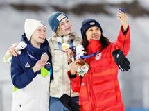 大けが克服、銅メダルに潤む目