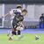 前半13分、栃木ＳＣのＭＦ川名（手前）が相手と競り合う＝カンセキスタジアムとちぎ、広瀬華撮影