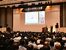 全国都市問題会議で報告する森本教授