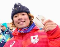 美容師の父と二人三脚、滑り磨く