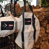 エアバッグ生地、薪バッグに変身　ワイルドワンと廃車王がコラボ