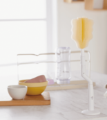 「＼広口ほ乳びんのための／取り替えができる 回転式ほ乳びん洗い」がアカ…