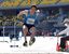 陸上男子２部走り幅跳びで優勝した本県の久保野＝宇都宮市のカンセキスタジアムとちぎ