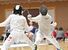 フェンシング女子フルーレ団体リーグ戦　宇中央戦でポイントを奪う栃商の名淵（右）＝上三川町体育センター