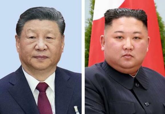 中国の習近平国家主席、北朝鮮の金正恩朝鮮労働党総書記(朝鮮通信=共同)