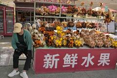 中国消費3年ぶりマイナス
