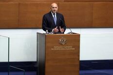 親ロシア派首相の内閣発足