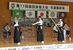 弓道成年女子遠的で初優勝した栃木県チーム。左からアリ、滝田、犬塚＝12日午前11時30分、ユウケイ武道館