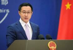 中国外務省、記者退去を正当化
