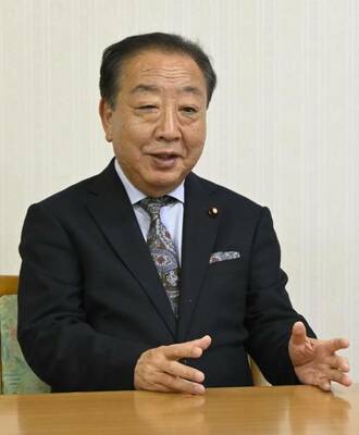 インタビューに応じる野田代表＝２５日夕、宇都宮市駒生１丁目