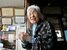 那珂川町谷川の自宅で自身の半生を語り、笑顔を見せる箱石シツイさん＝2024年10月４日、那珂川町