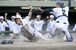 ９回、栃工の捕手・永田（右）が遊ゴロと送球の間に本塁を突いた二走をタッチアウトにし、試合終了＝エイジェックスタジアム、森田大地撮影