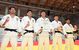 柔道成年男子で優勝し、笑顔を見せる栃木県選抜の（左から）北野、長島、熊代、斎五澤、山本＝９日午後０時45分、宇都宮市のユウケイ武道館