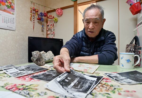 鉱員時代や閉山後の思い出を語る高田さん。今も妻と2人、足尾で暮らす=27日午前10時30分、日光市足尾地域