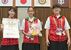 弓道成年女子遠的で優勝した栃木県チーム。左から犬塚、アリ、滝田＝ユウケイ武道館