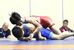 レスリング男子団体準々決勝　足大付－大体大浪商　65キロ級で足大付の坂本（上）が相手のバックを取る＝島根県の雲南市三刀屋文化体育館アスパル