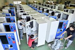 新紙幣対応で両替機製造大忙し