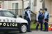 事件があった住宅付近を警戒する警察官=6日午前、群馬県伊勢崎市