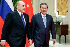 ロシア首相が訪中、関係強化図る